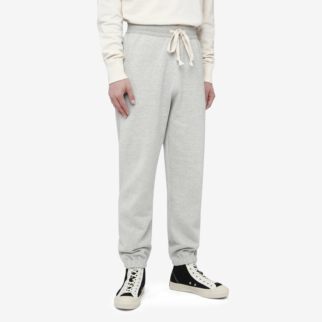 Un-Useless 170414 SWKNIT inlay knit sweatpants made in Japan tapered silhouette grey full view wear image front side