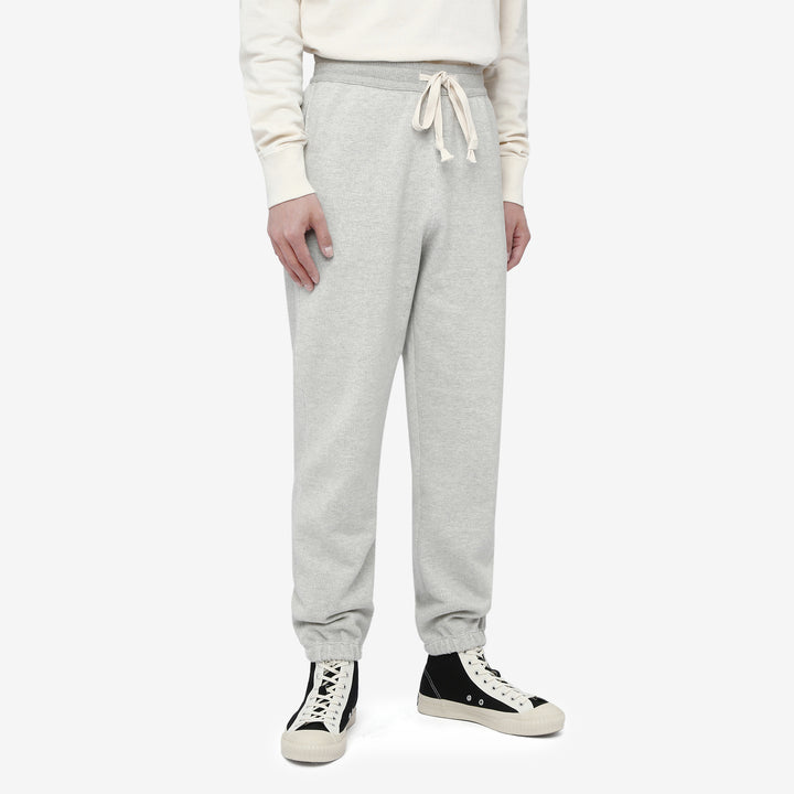 Un-Useless 170414 SWKNIT inlay knit sweatpants made in Japan tapered silhouette grey full view wear image front side