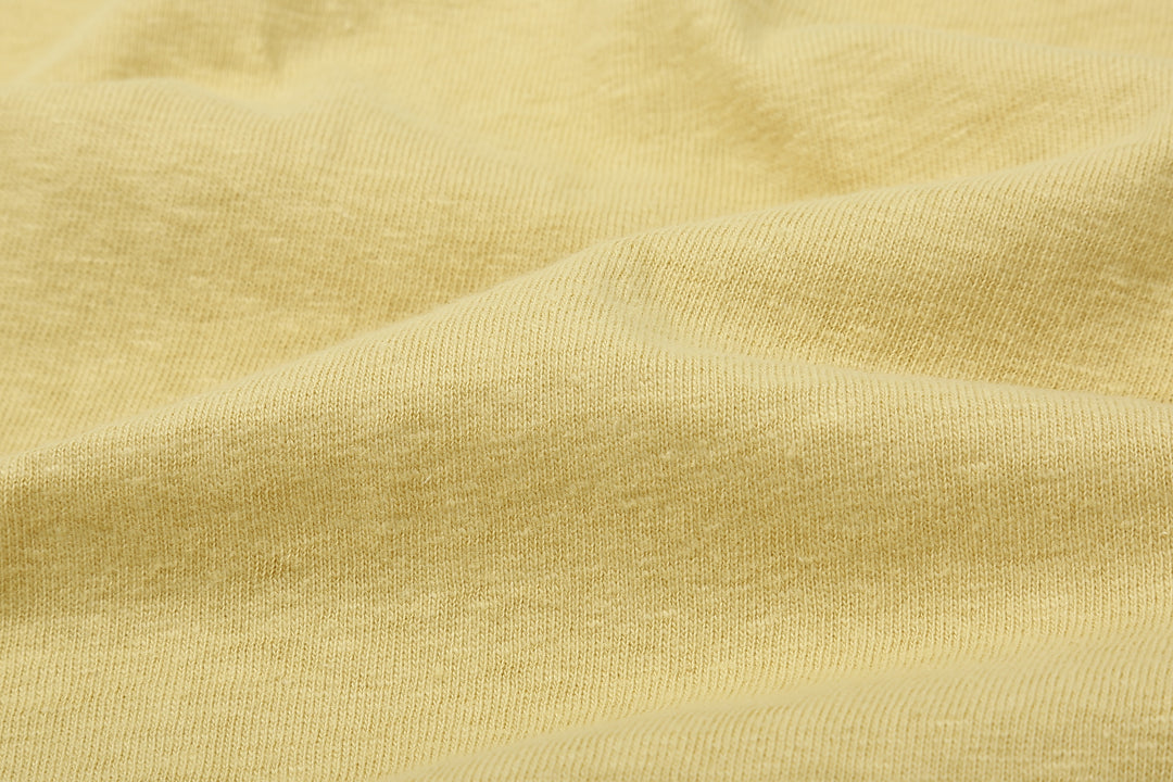 Warehouse 4064 2nd hand crocodile graphic T-shirt short sleeve vintage faded print made in Japan cotton cream yellow fabric close up