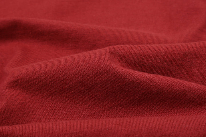 The Flat Head FN-THC-054SP eagle embroidery style print T-shirt light red fabric close up