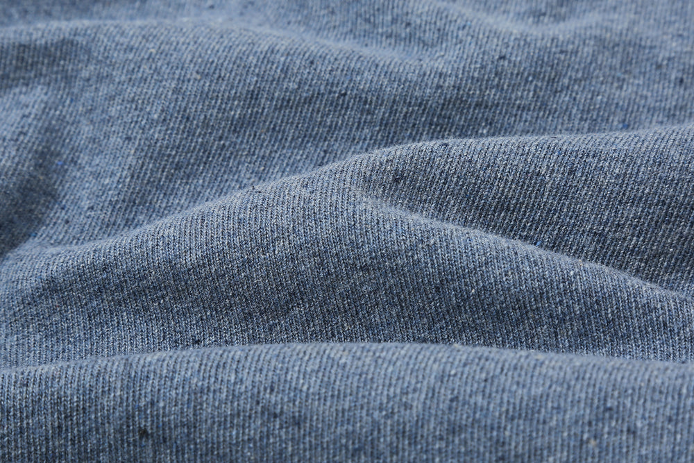 UES recycled denim short sleeve T-shirt made in Japan indigo heather blue fabric close up