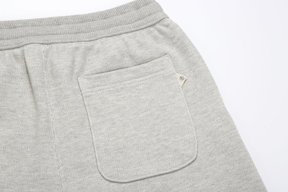 Un-Useless 170414 SWKNIT inlay knit sweatpants made in Japan tapered silhouette grey back pocket