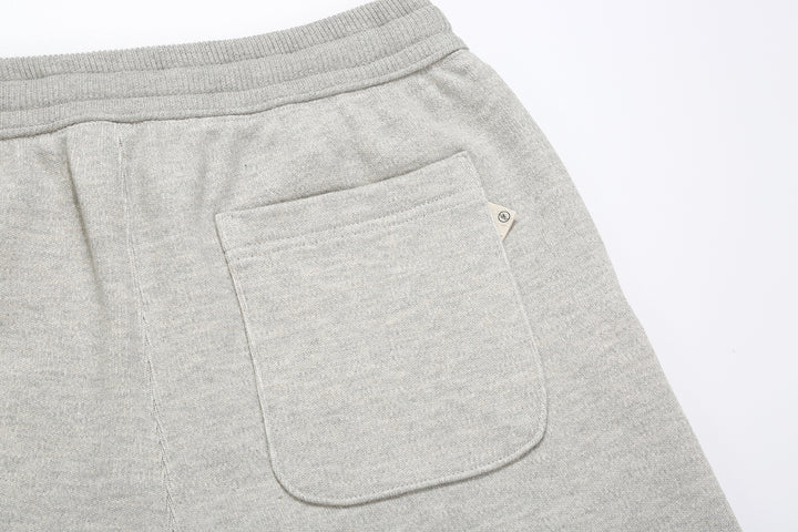 Un-Useless 170414 SWKNIT inlay knit sweatpants made in Japan tapered silhouette grey back pocket