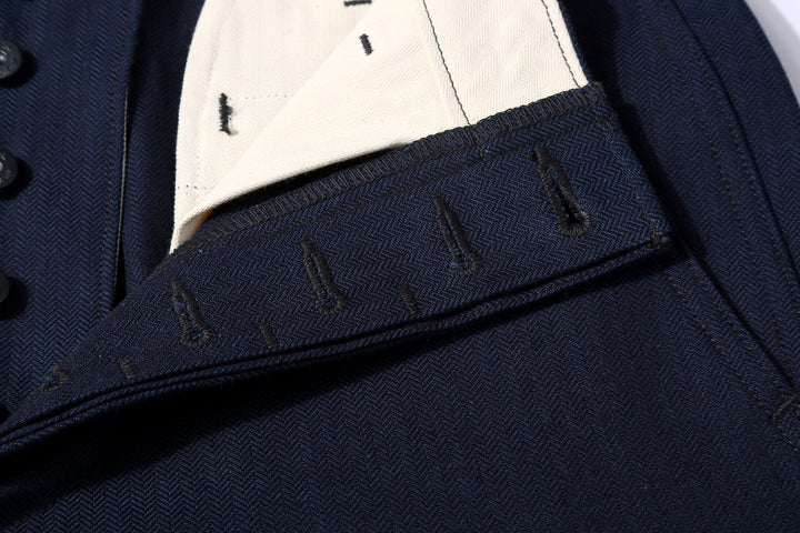 Boncoura 41 indigo herringbone trousers front view button holes close up