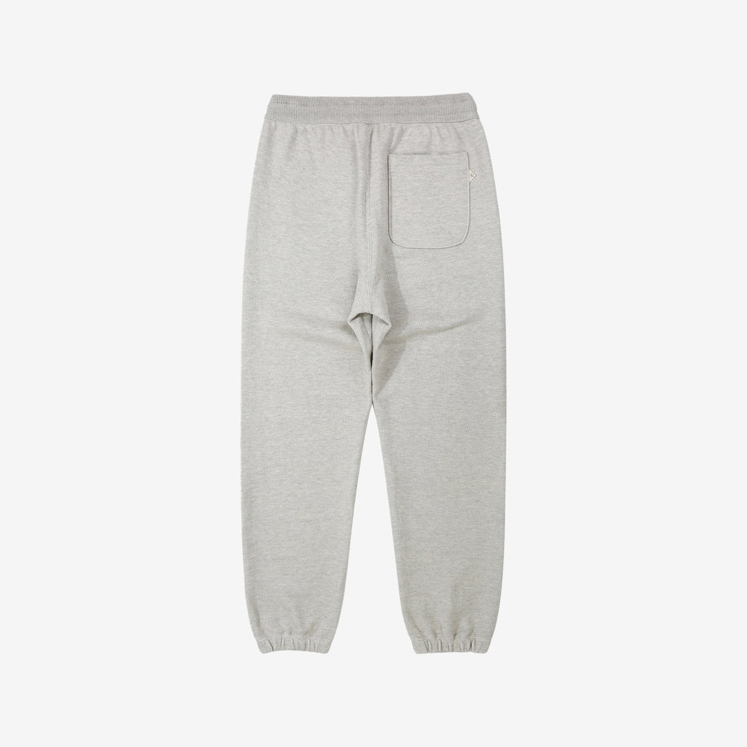 Un-Useless 170414 SWKNIT inlay knit sweatpants made in Japan tapered silhouette grey back full view