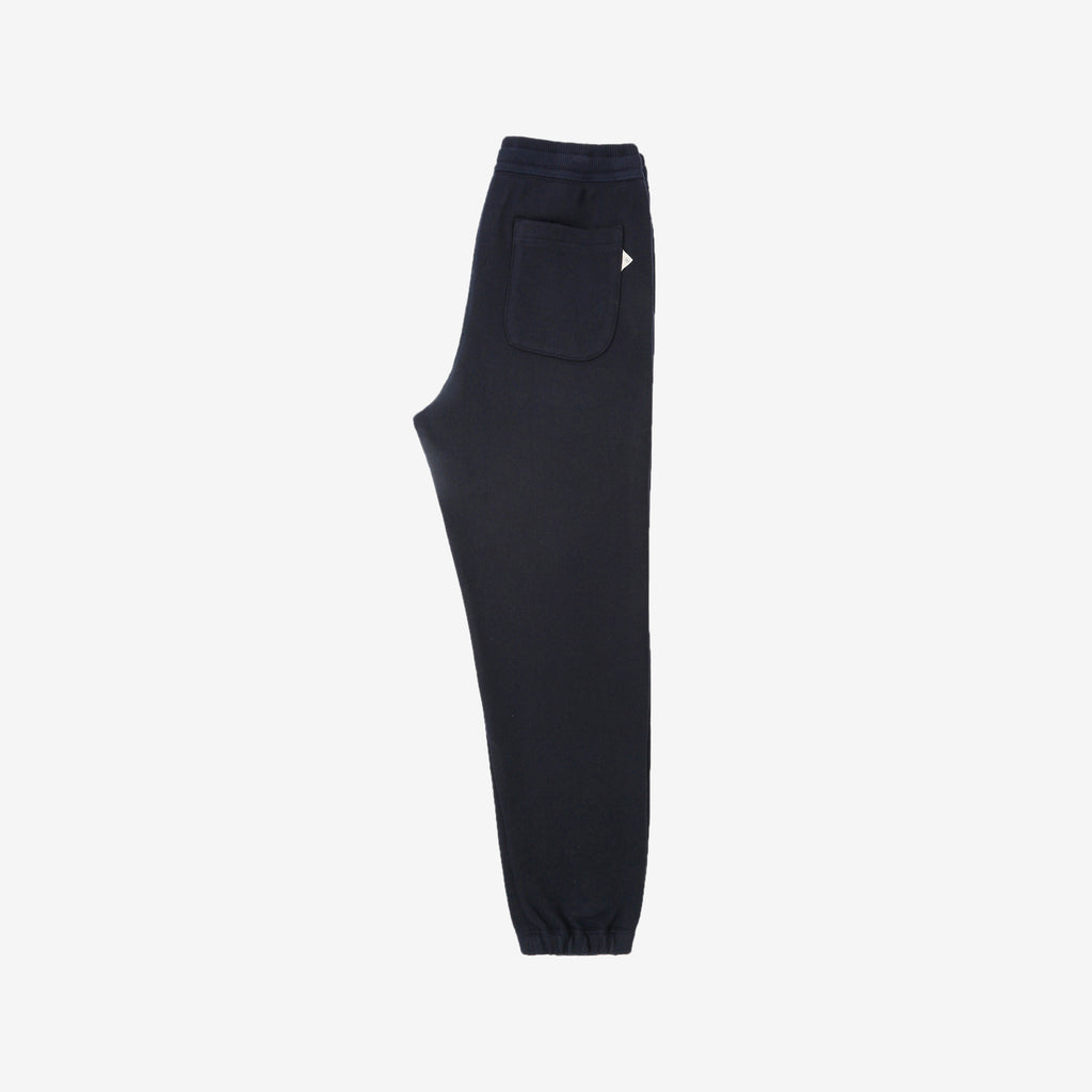 Un-Useless 170414 SWKNIT inlay knit sweatpants made in Japan tapered silhouette navy full view 
