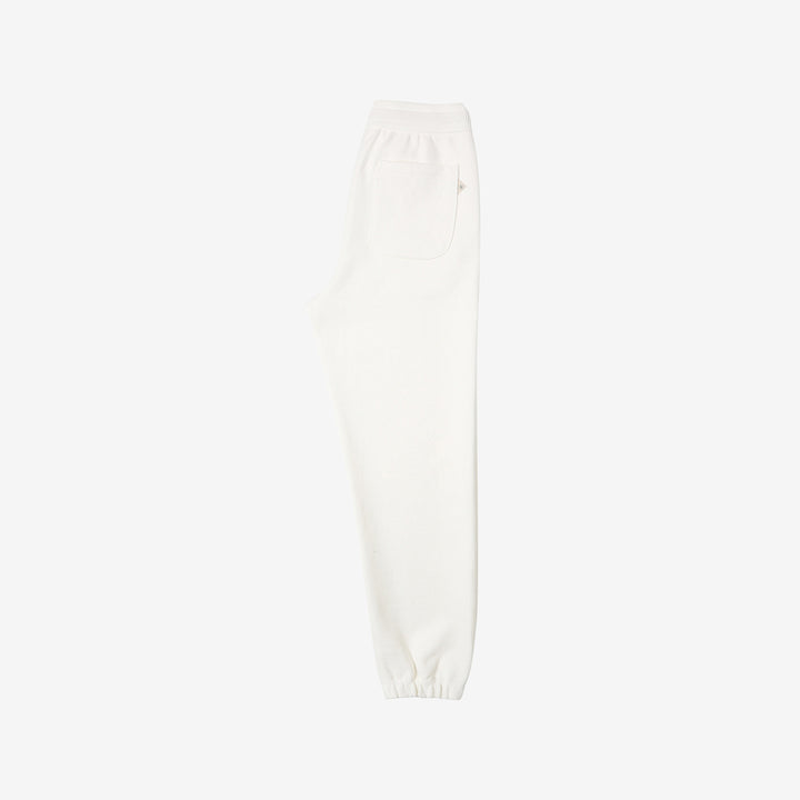Un-Useless 170414 SWKNIT inlay knit sweatpants made in Japan tapered silhouette white full view 
