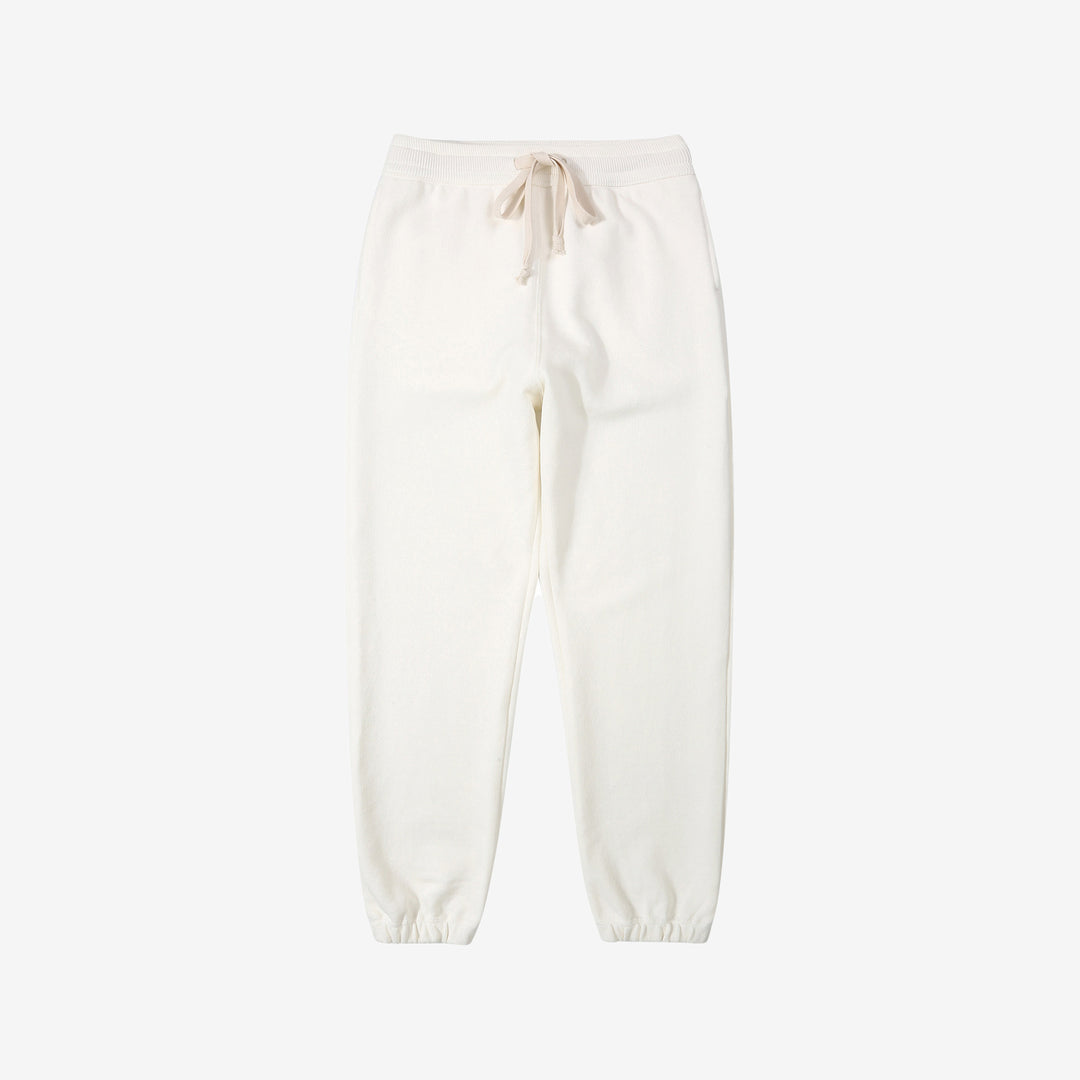 Un-Useless 170414 SWKNIT inlay knit sweatpants made in Japan tapered silhouette white full view 