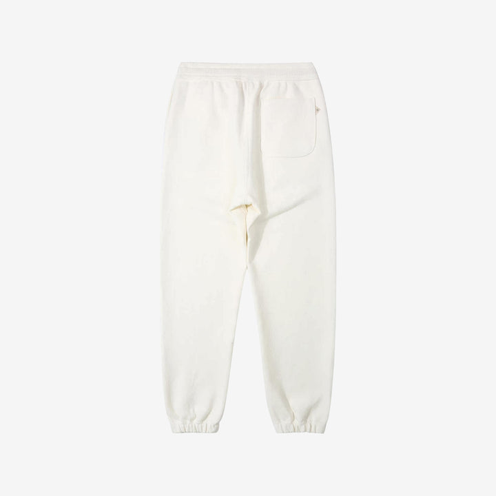Un-Useless 170414 SWKNIT inlay knit sweatpants made in Japan tapered silhouette white back view 